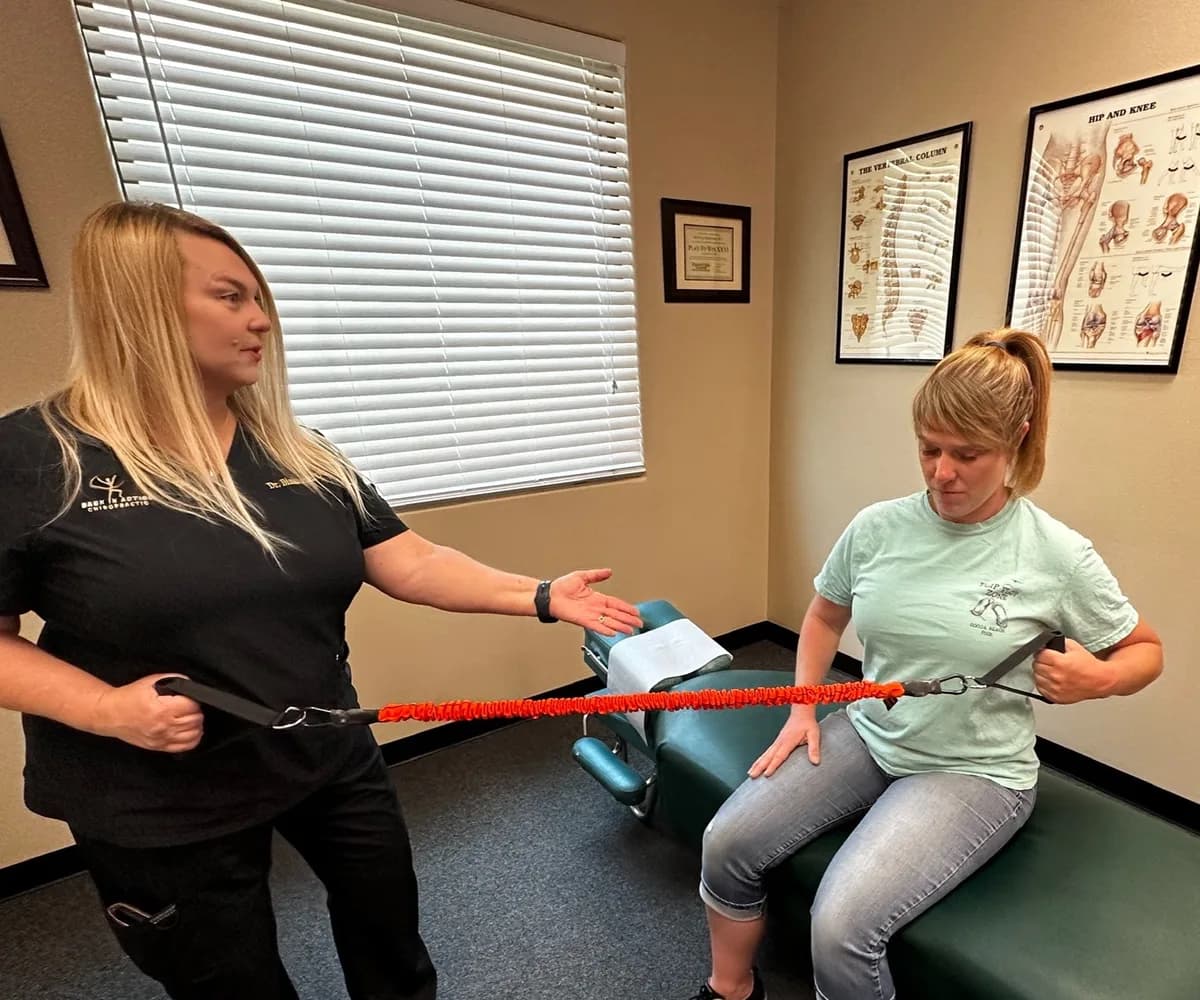 Rehabilitation exercise session using a resistance band at Back in Action Chiropractic in Las Vegas