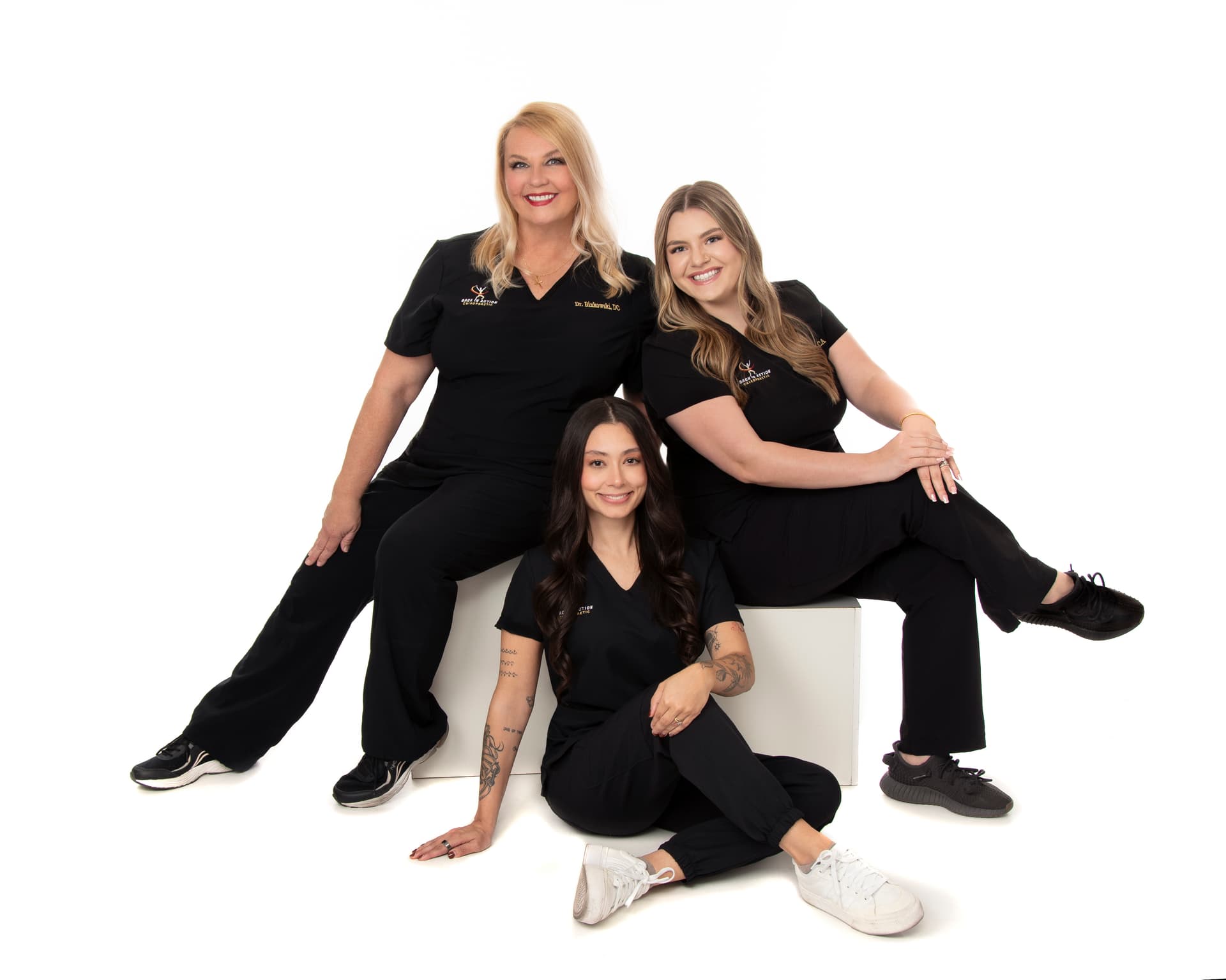 Dr. Binkowski with Shyanne and the licensed massage therapist at Back in Action Chiropractic